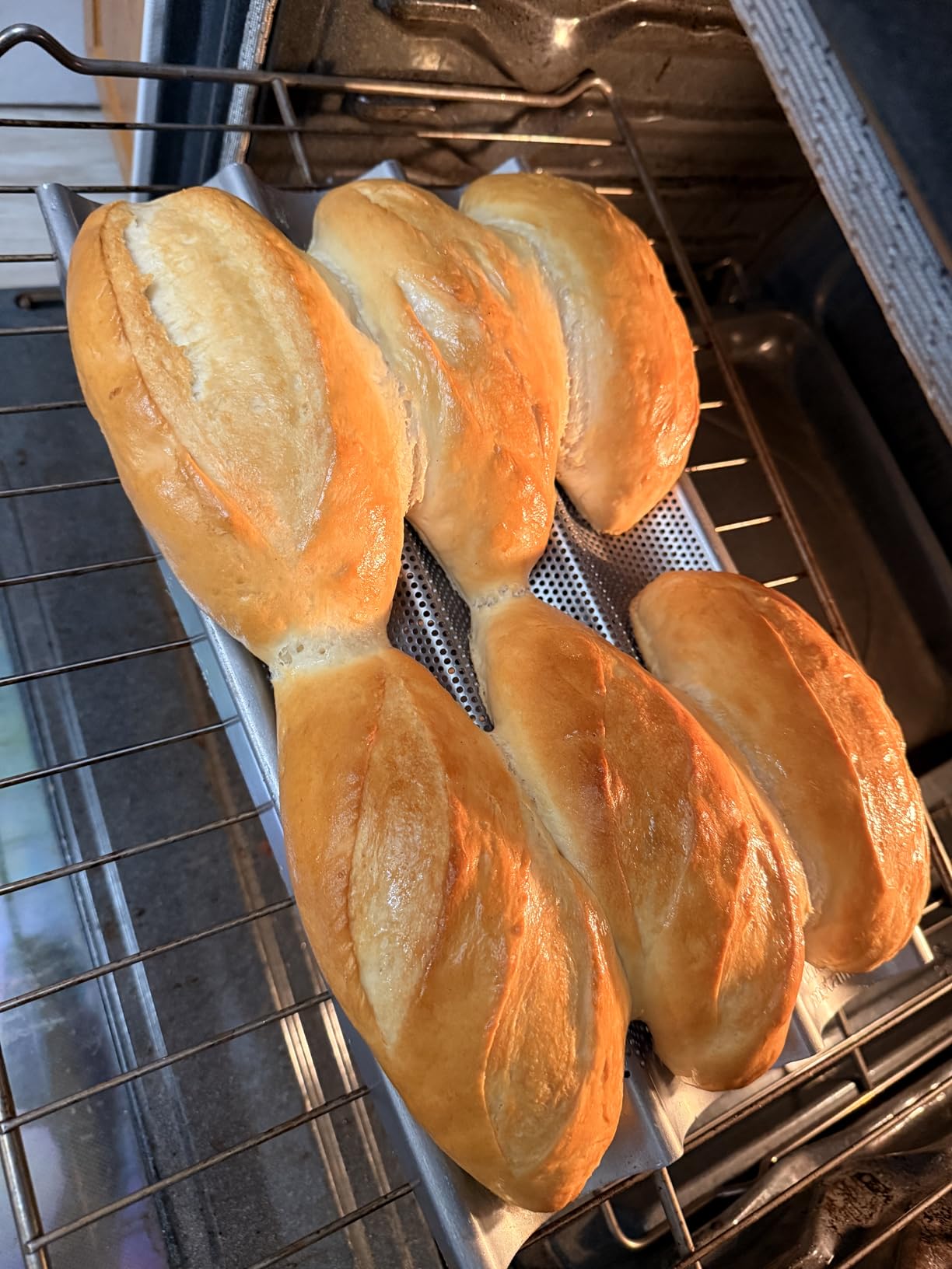 Chicago Metallic Commercial II Non-Stick Perforated Baguette Pan. Creates a crisp, golden-brown crust, 16 L x 9 W x 1.5 H customer photo 1
