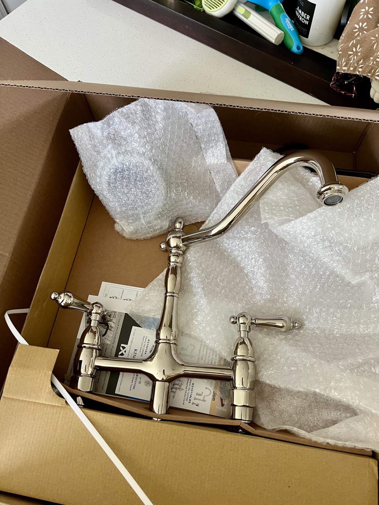 Kingston Brass KS1273ALBS Heritage 8-Inch Kitchen Bridge Faucet with Brass Sprayer, Antique Brass - Customer Photo 1