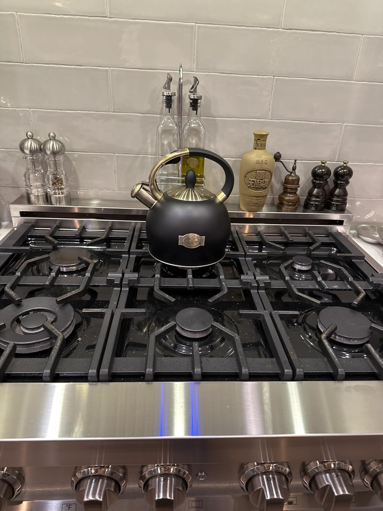 SUSTEAS Stove Top Whistling Tea Kettle - Food Grade Stainless Steel Teakettle Teapot with Cool Touch Ergonomic Handle, With 1 Silicone Pinch Mitt Included, 2.64 Quart(BLACK) - Customer Photo 4