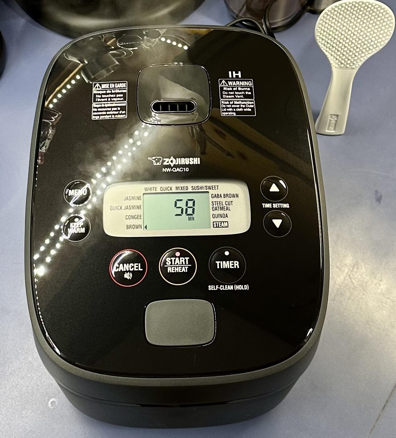 Zojirushi NW-QAC10 5.5-Cup Capacity Flat-Top Induction Cooker and Warmer with Custom Cooking Pan, Double Non-Stick Coating for Easy Clean-Up (Black) - Customer Photo 2