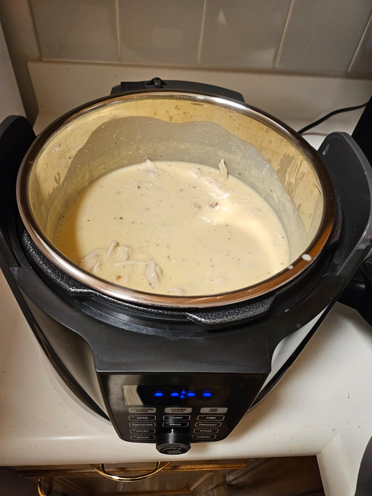 Nuwave Duet Air Fryer, Electric Pressure Cooker & Grill Combo, 540 IN 1 Multicooker with 3 Removable Lids, Slow Cook, Sautés, Dehydrator, 18/10 SS Pot, Sure-Lock Safety Tech & 13 Deluxe Accessories - Customer Photo 1