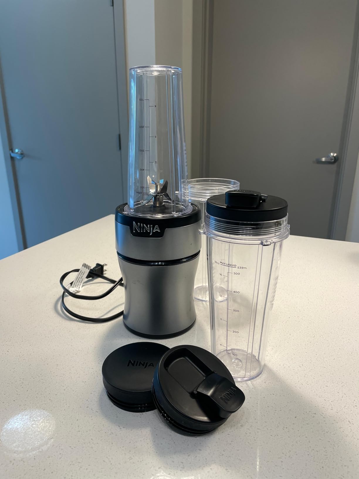 Ninja BN301 Nutri-Blender Plus Compact Personal Blender, 900-Peak-Watt Motor, Frozen Drinks, Smoothies, Sauces & More, (3) 20 oz. To-Go Cups, (2) Spout-Lids (1) Storage-Lid, Dishwasher Safe, Silver Customer Review Ninja BN301 Nutri-Blender Plus Compact Personal Blender, 900-Peak-Watt Motor, Frozen Drinks, Smoothies, Sauces & More, (3) 20 oz. To-Go Cups, (2) Spout-Lids (1) Storage-Lid, Dishwasher Safe, Silver - Customer Photo 1