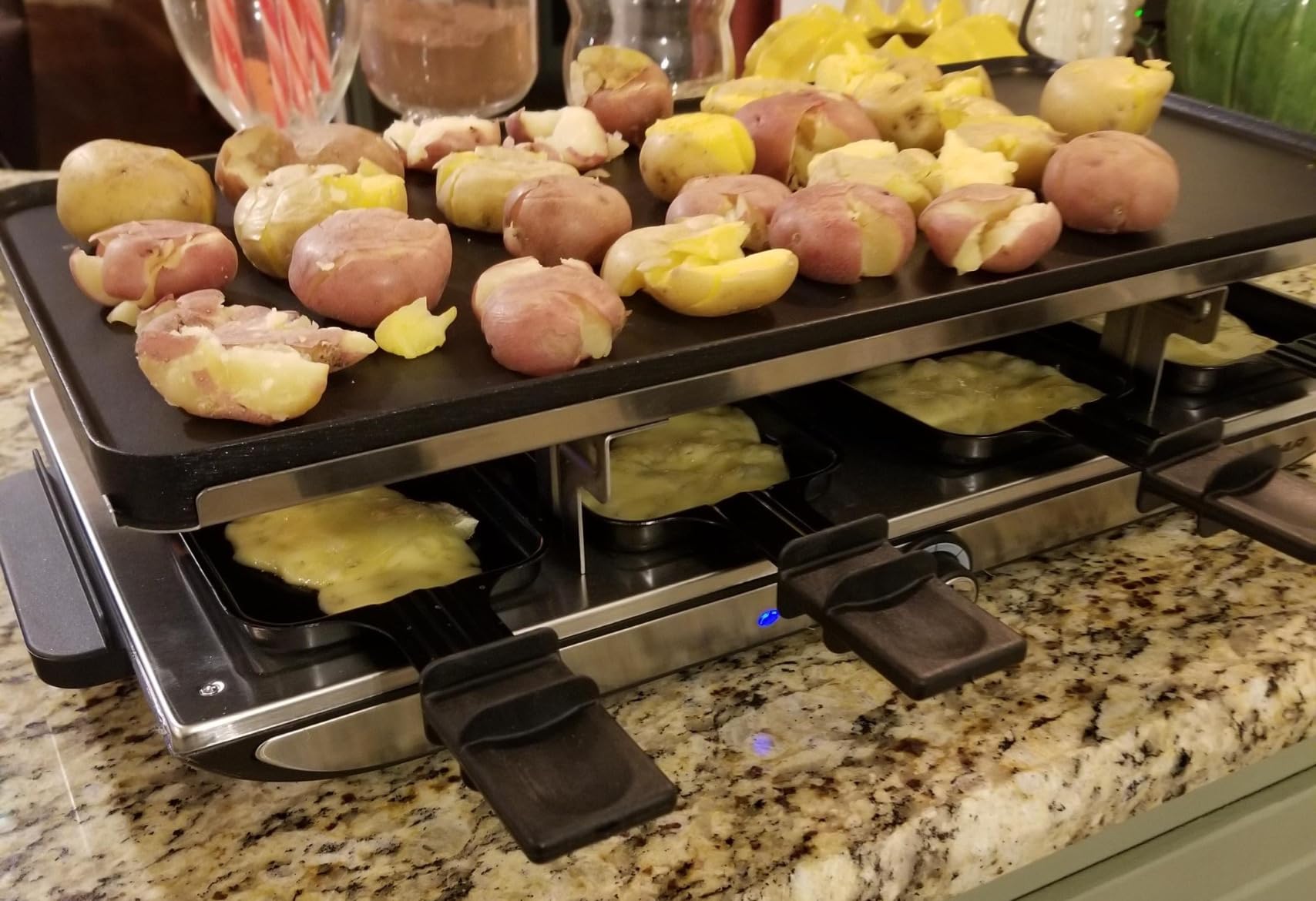 Swissmar Geneva Raclette Grill with Reversible Cast Aluminum Grill Top - Perfect for outdoor & Indoor Electric Raclette Grill & Griller - Barbeque Bonding - 4-Person customer photo 1