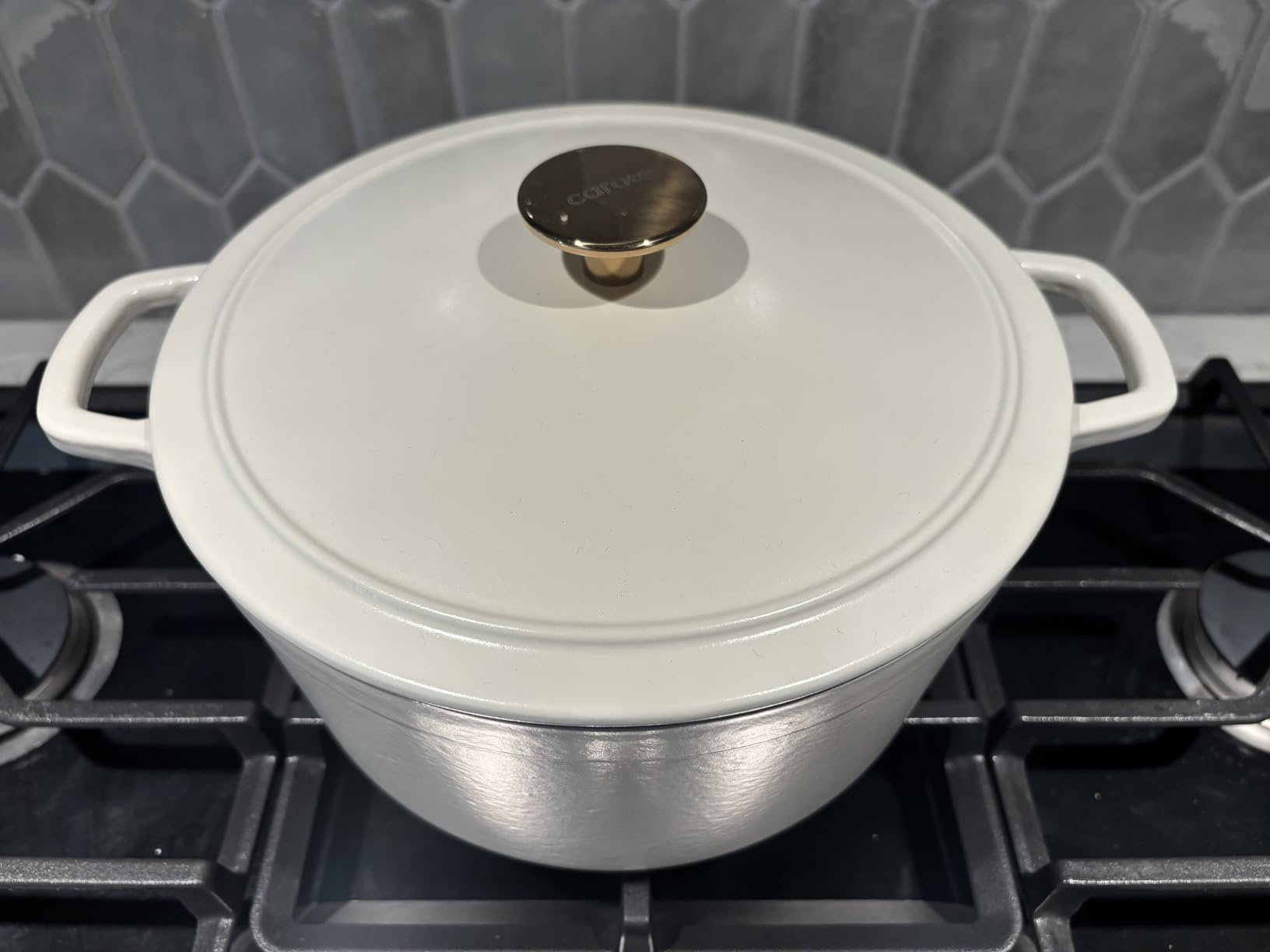 CAROTE 5QT Enameled Cast Iron Dutch Oven Pot with Lid, Heavy-Duty Dutch Oven for Sourdough Bread Baking, Braising, Stews, Roasting, Healthy & Non-Toxic, Dual Handles, All Stovetop Compatible, Oven Safe up to 500° F, Red Customer Review CAROTE 5QT Enameled Cast Iron Dutch Oven Pot with Lid, Heavy-Duty Dutch Oven for Sourdough Bread Baking, Braising, Stews, Roasting, Healthy & Non-Toxic, Dual Handles, All Stovetop Compatible, Oven Safe up to 500° F, Red - Customer Photo 1