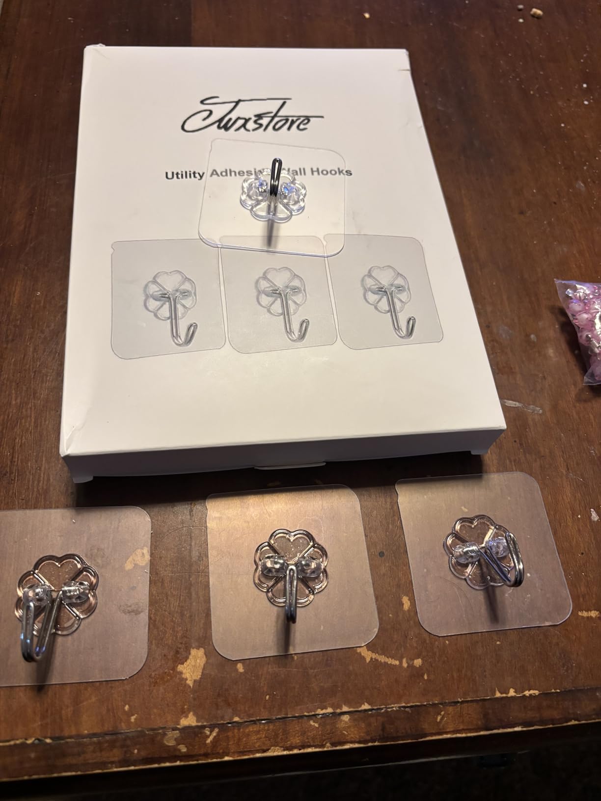 Jwxstore 24 Pack Self Adhesive Hooks Heavy Duty - 33lb Max, Transparent, Waterproof, Sticky Wall Hooks for Keys, Bathroom, Shower, Outdoor, Kitchen, Door, Home Improvement, Utility Hooks customer photo 1