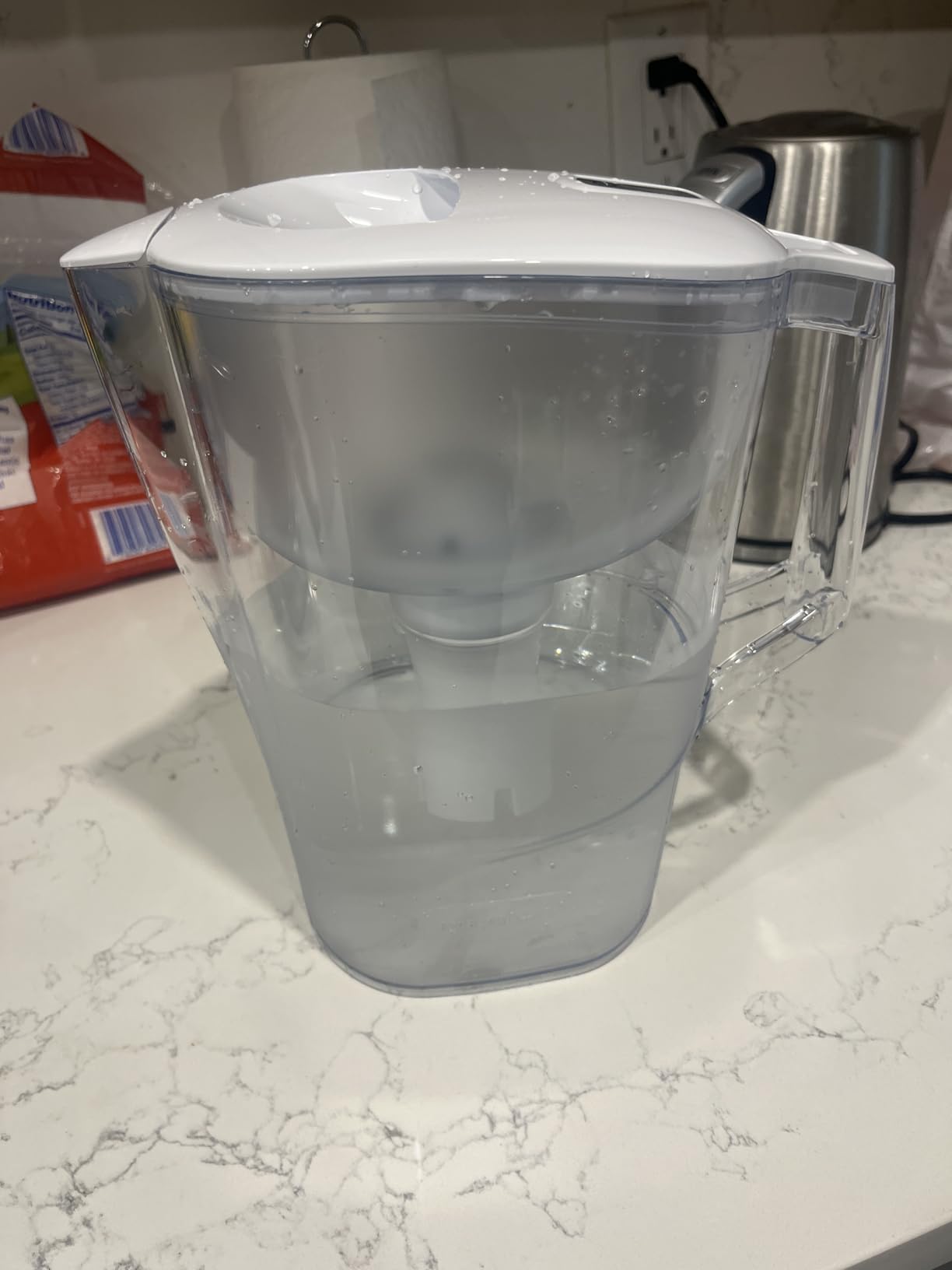 Amazon Basics 10-Cup Pitcher with Filter Compatible with Brita Water Filter Pitcher for Clean, Crisp Water, WQA and NSF Certified, Made in Europe customer photo 1