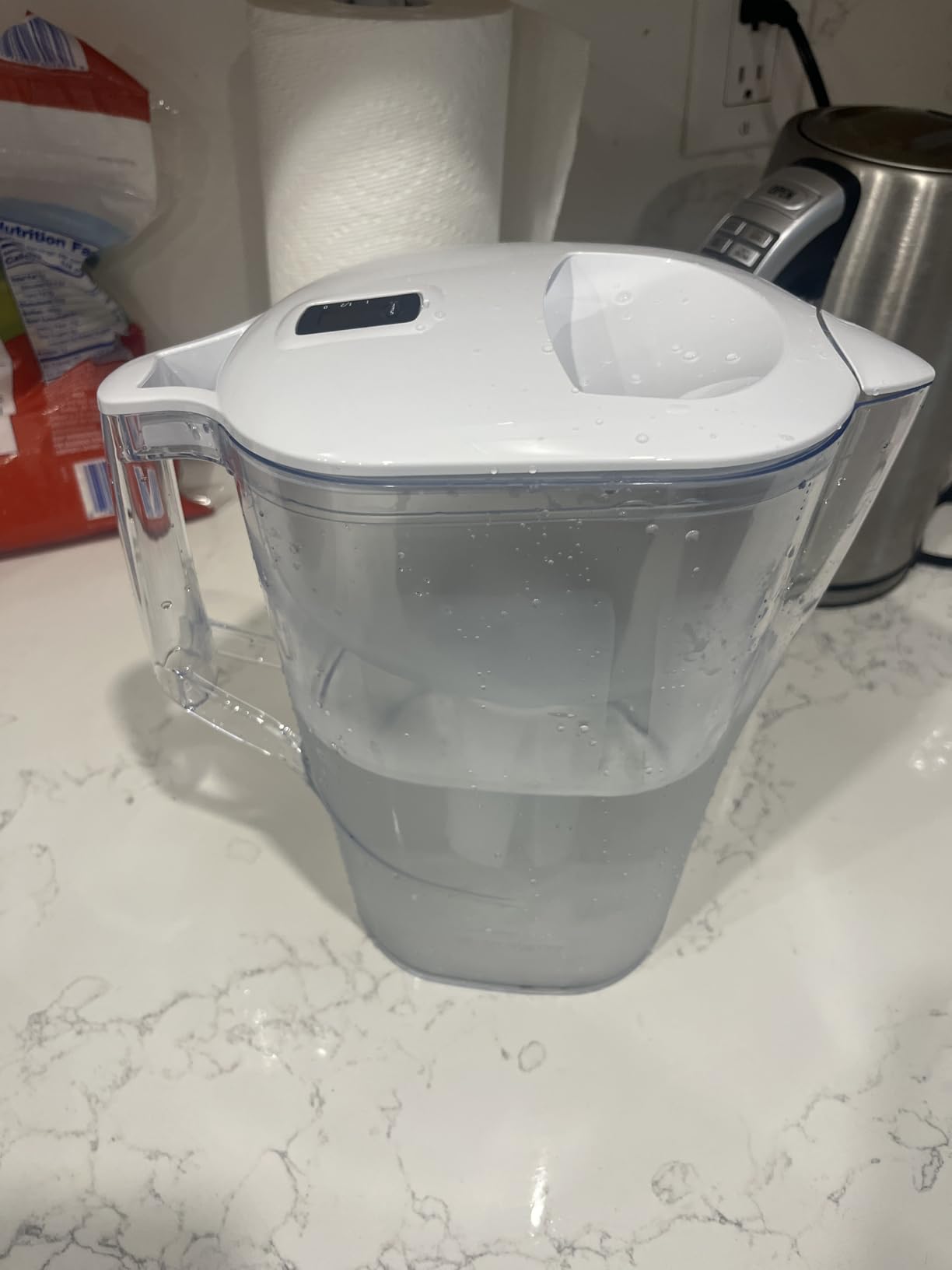 Amazon Basics 10-Cup Pitcher with Filter Compatible with Brita Water Filter Pitcher for Clean, Crisp Water, WQA and NSF Certified, Made in Europe customer photo 2