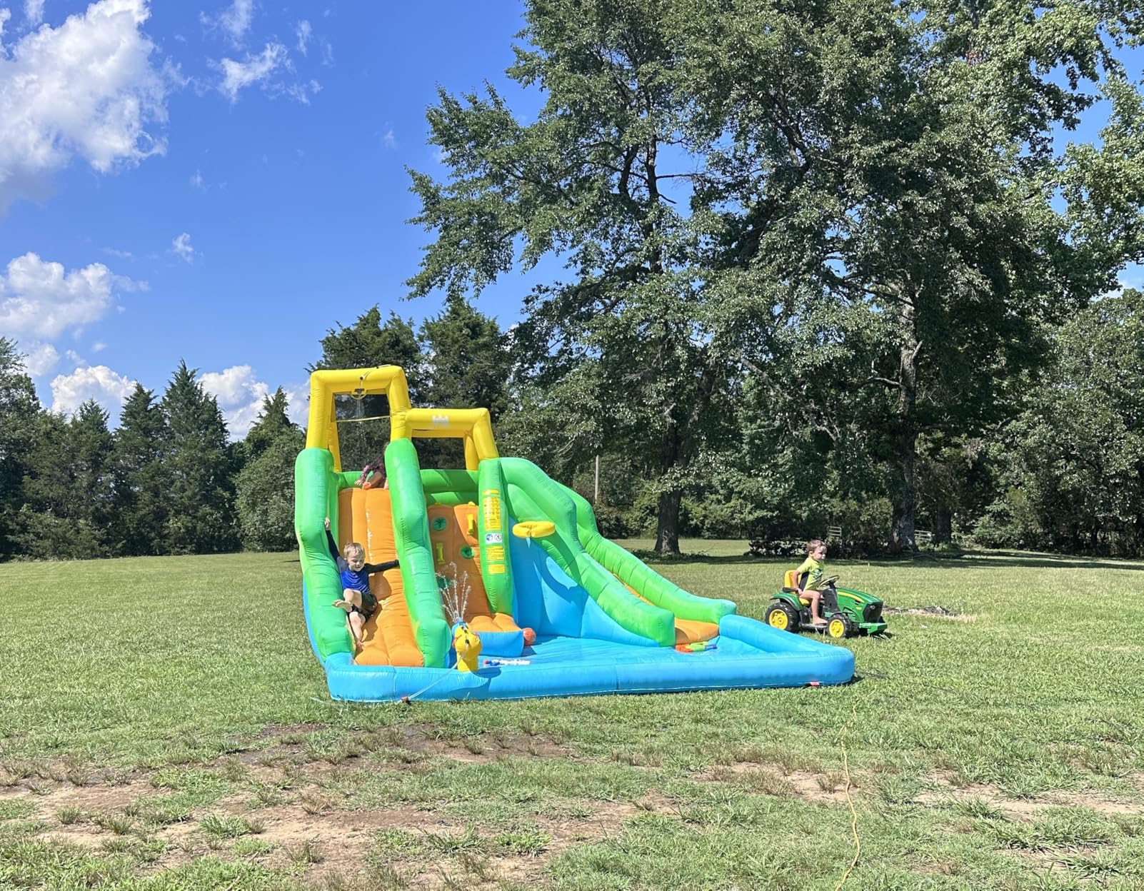 BOUNTECH Inflatable Water Slide, Dual Slides Giant Water Park Jump Castle 6 in 1 with Blower for Outdoor Racing Fun, Climbing Wall, Blow up Water Slides Inflatables for Big Kids 3-10 Outdoor Indoor customer photo 1