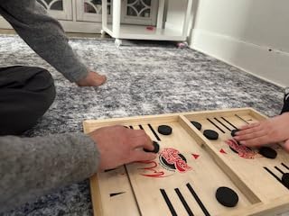 Fast Sling Puck Game - Test Your Speed and Accuracy with This Fast-Paced Wooden Air Hockey Board Game customer photo 1