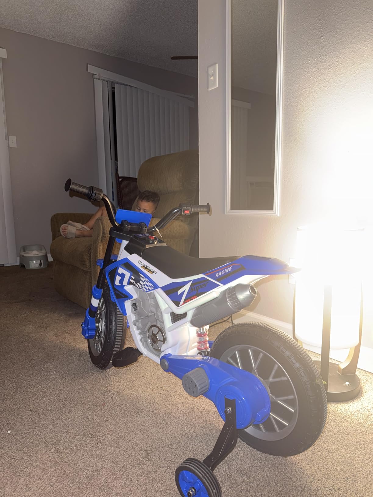 JOYLDIAS Kids Motorcycle Dirt Bike, 12V7AH Battery-Powered Ride On Motorcycle for Kids, Off-Road Street Bike w/Training Wheels, Music, Spring Suspension, High/Low Speeds, Green customer photo 1