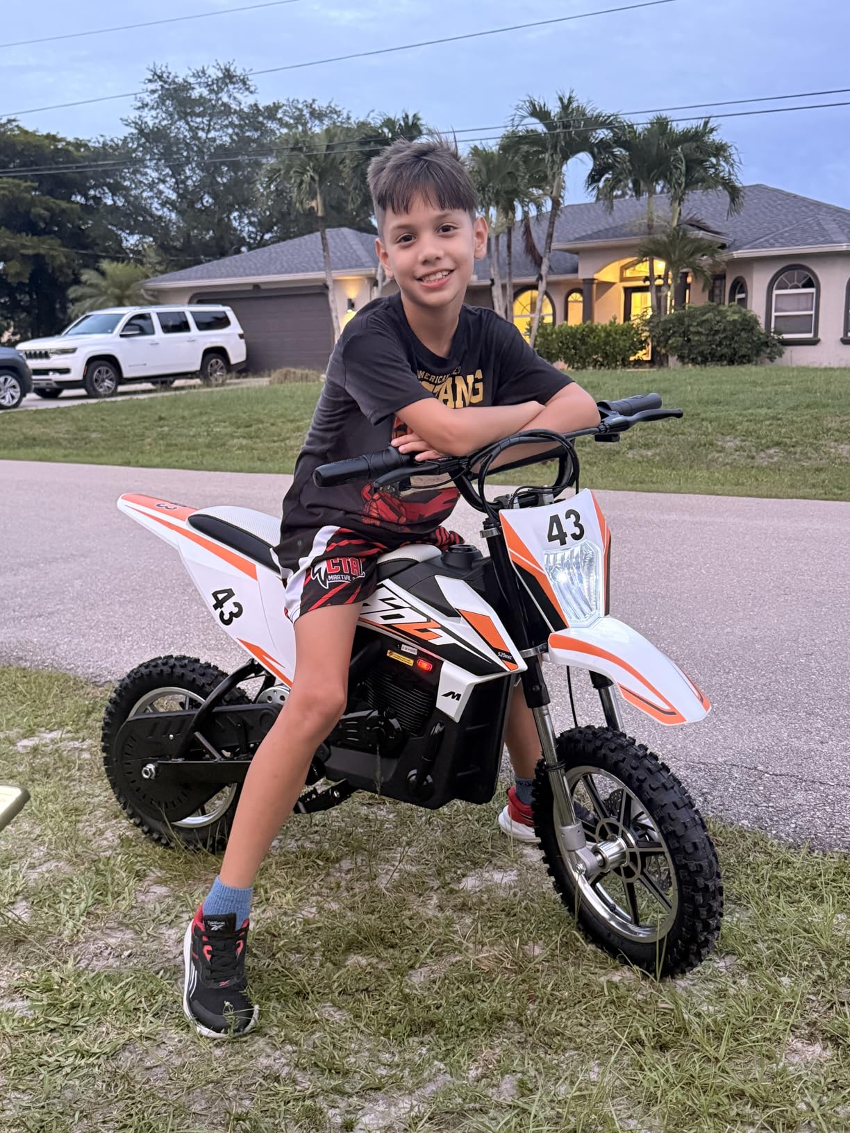 Blitzshark 36V 650W Kids Electric Dirt Bike Off-Road Motocross Ultra Powerful Motorcycle, with 17 MPH MAX Speed, Rubber Tire, Twist Grip Throttle, Dual Suspension & Brakes, Leather Seat, SRK-MC20 Pro customer photo 1