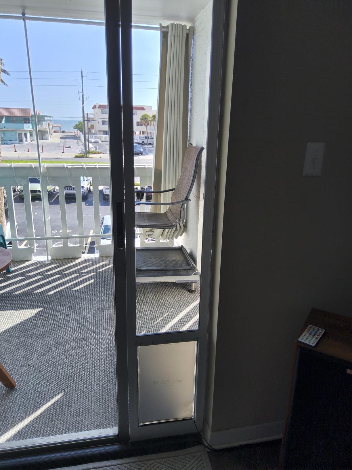 PetSafe Sliding Glass Pet Door, 1 Piece, Medium Dogs to 40 lbs, White | Adjustable Height 75 7/8 to 80 11/16 Inches, No-Cut DIY Install into Existing Track, Magnetic Flap, Durable Aluminum Frame customer photo 2