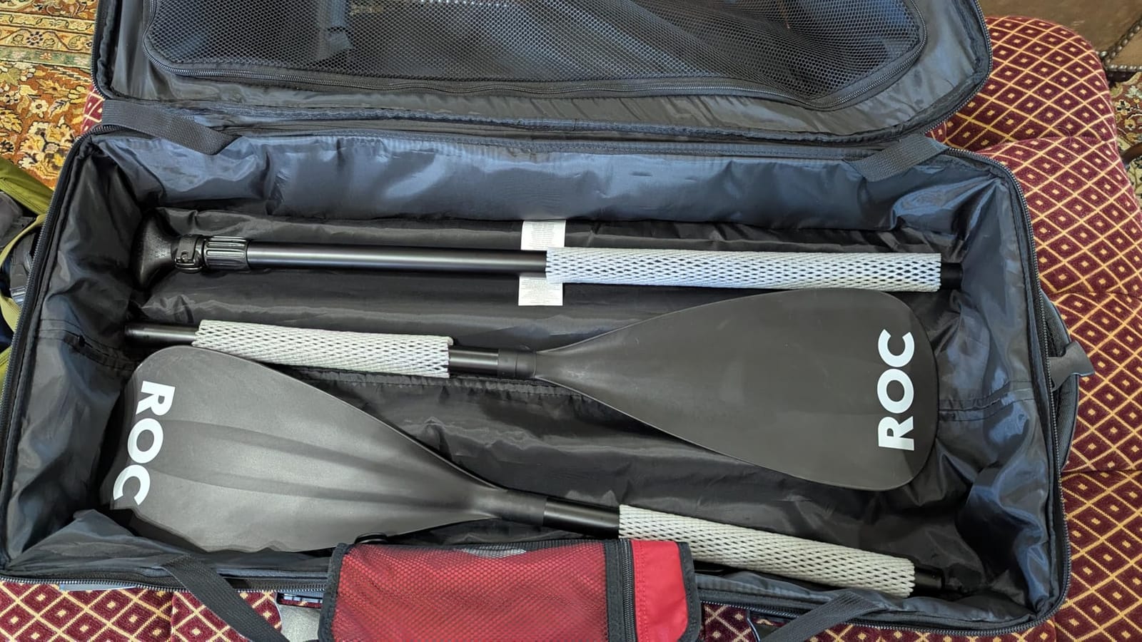 Amazon Basics 30-Inch Large Rolling Duffel Bag with Wheels and Handle, Durable Ripstop Polyester, 2 Layers of Space, Multiple Interior and Exterior Pockets, Black customer photo 1
