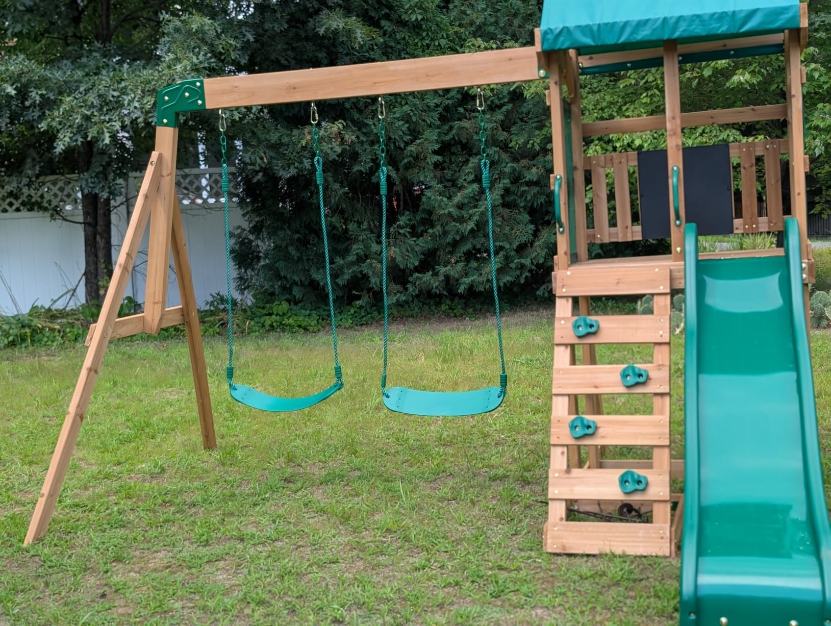 Backyard Discovery Buckley Hill Cedar Wood Swing Set with Wave Slide, Play Deck, Rock Wall Ladder, Belt Swings, Chalkboard, Canopy Roof, Outdoor Playset customer photo 1