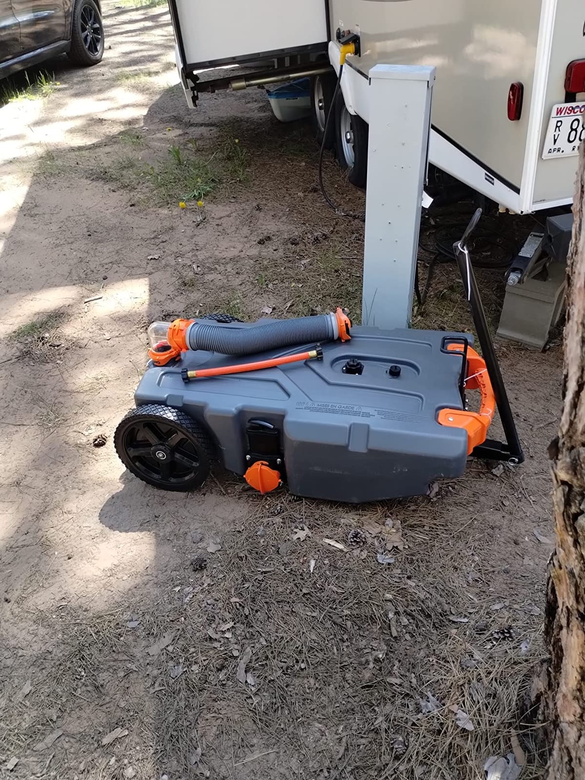 Camco Rhino 28-Gal RV Tote Tank - Steerable Front Wheels - Made in the USA | 2 Steerable No-Flat Front Wheels & Built-In Gate Valve - Removable 24