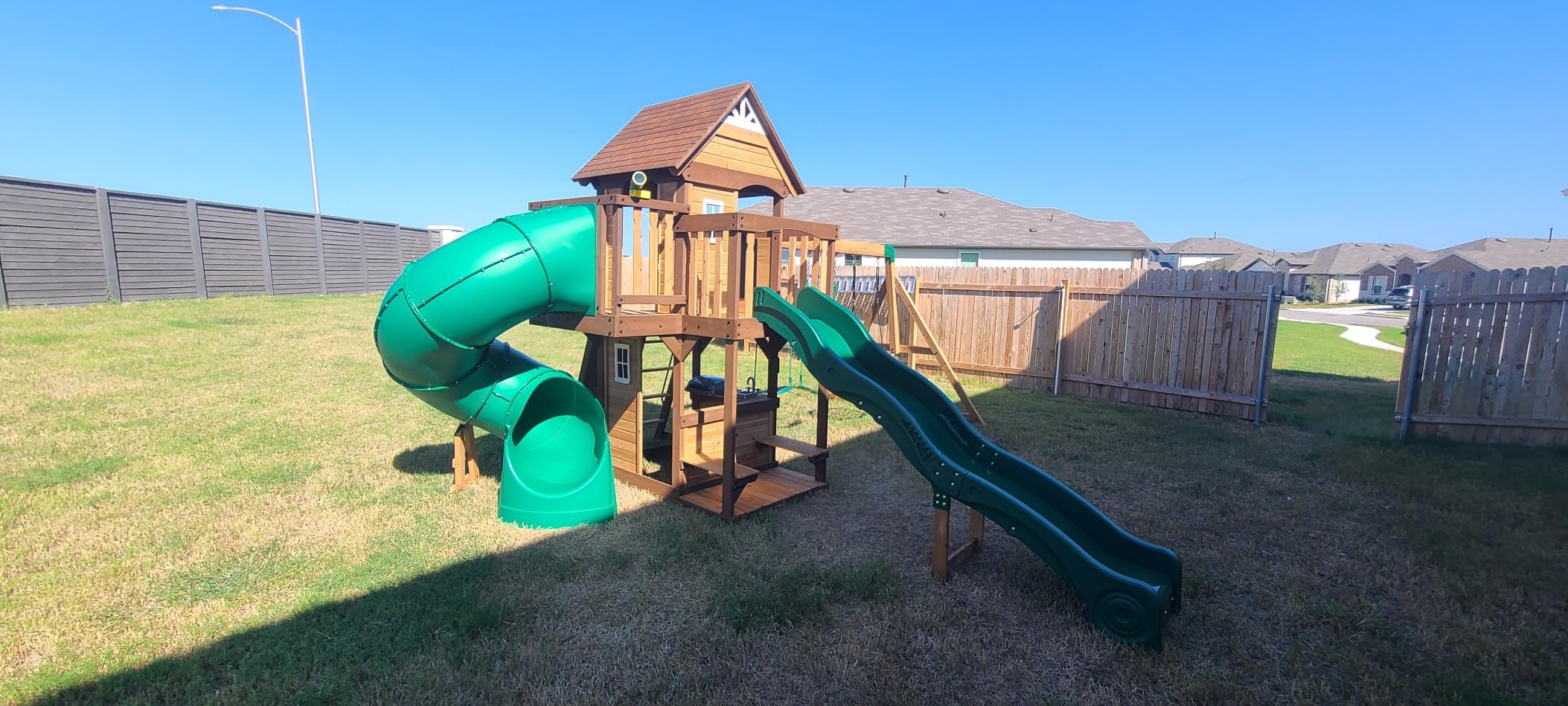Backyard Discovery Cedar Cove Cedar Wood Swing Set with Spiral Tube Slide, Wave Slide, Clubhouse, Toy Grill, Snack Bar, Rock Wall, Belt Swings, Web Swing, Balcony, Chalkboard, Ladder, Outdoor Playset customer photo 2