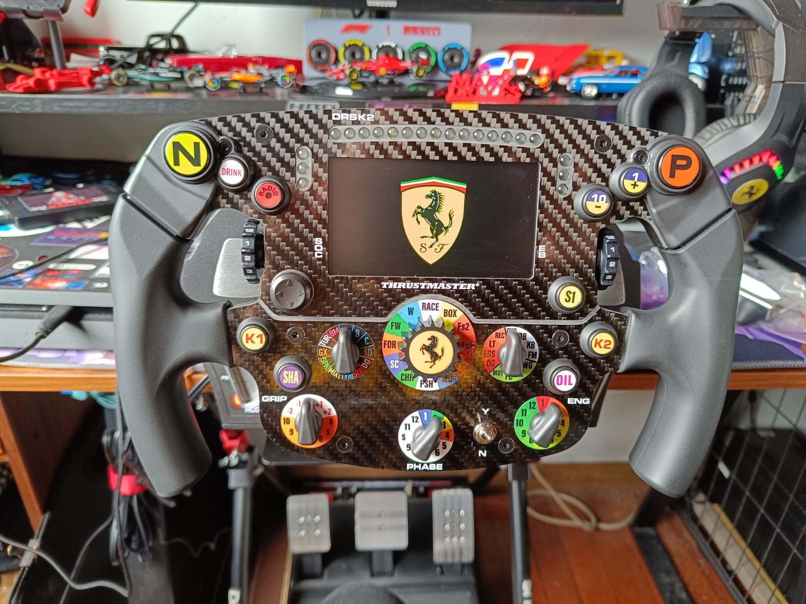 Thrustmaster Ferrari SF1000 Formula Wheel Add-On Rim - PS5, XBOX & PC | licensed by Ferrari, 4.3-in LCD, 21-layer carbon faceplate, 25 programable buttons, 7 encoders, aluminum shifter paddles customer photo 2