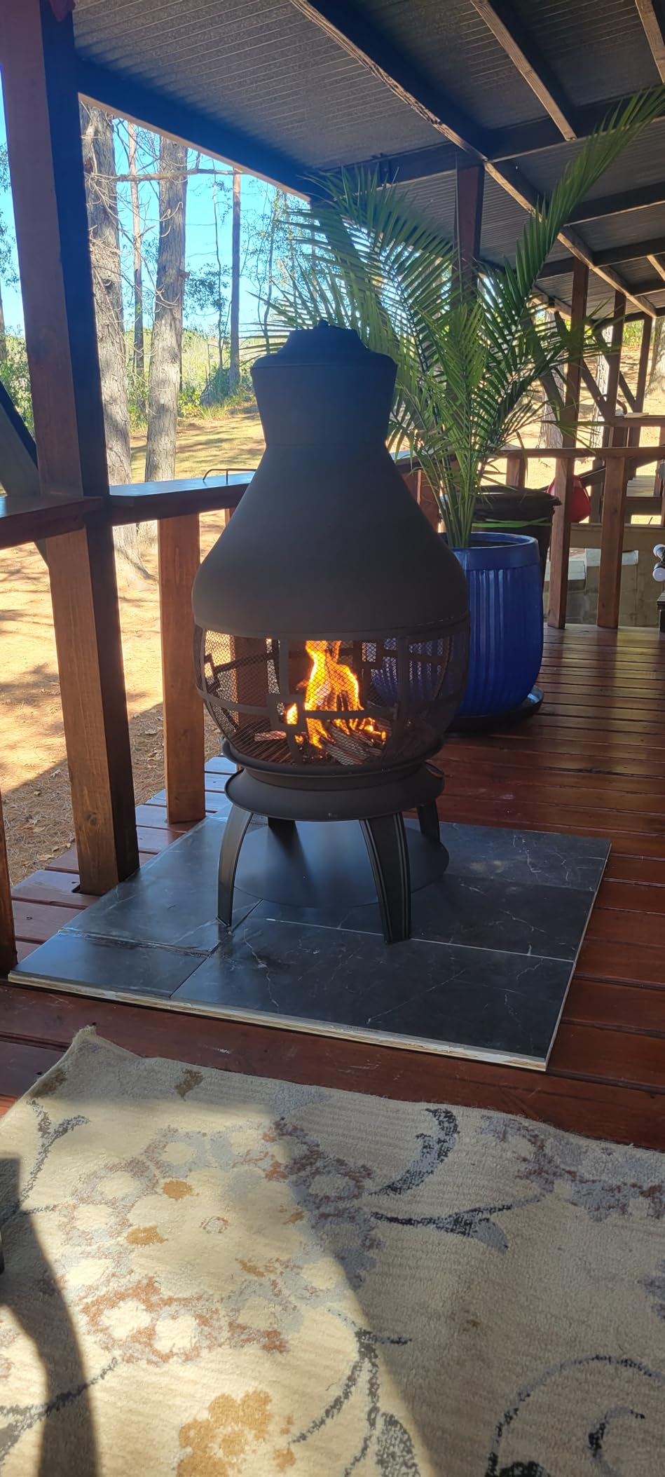 Giantex Wood Burning Chiminea, Heavy Duty Fireplace Chiminea Wooden Fire Pit with 2-piece Log Grate, Premium Rain Cap & Fire Poker, 360°Fire Retardant Mesh Cover, Ideal for Garden, Patio, Backyard customer photo 1