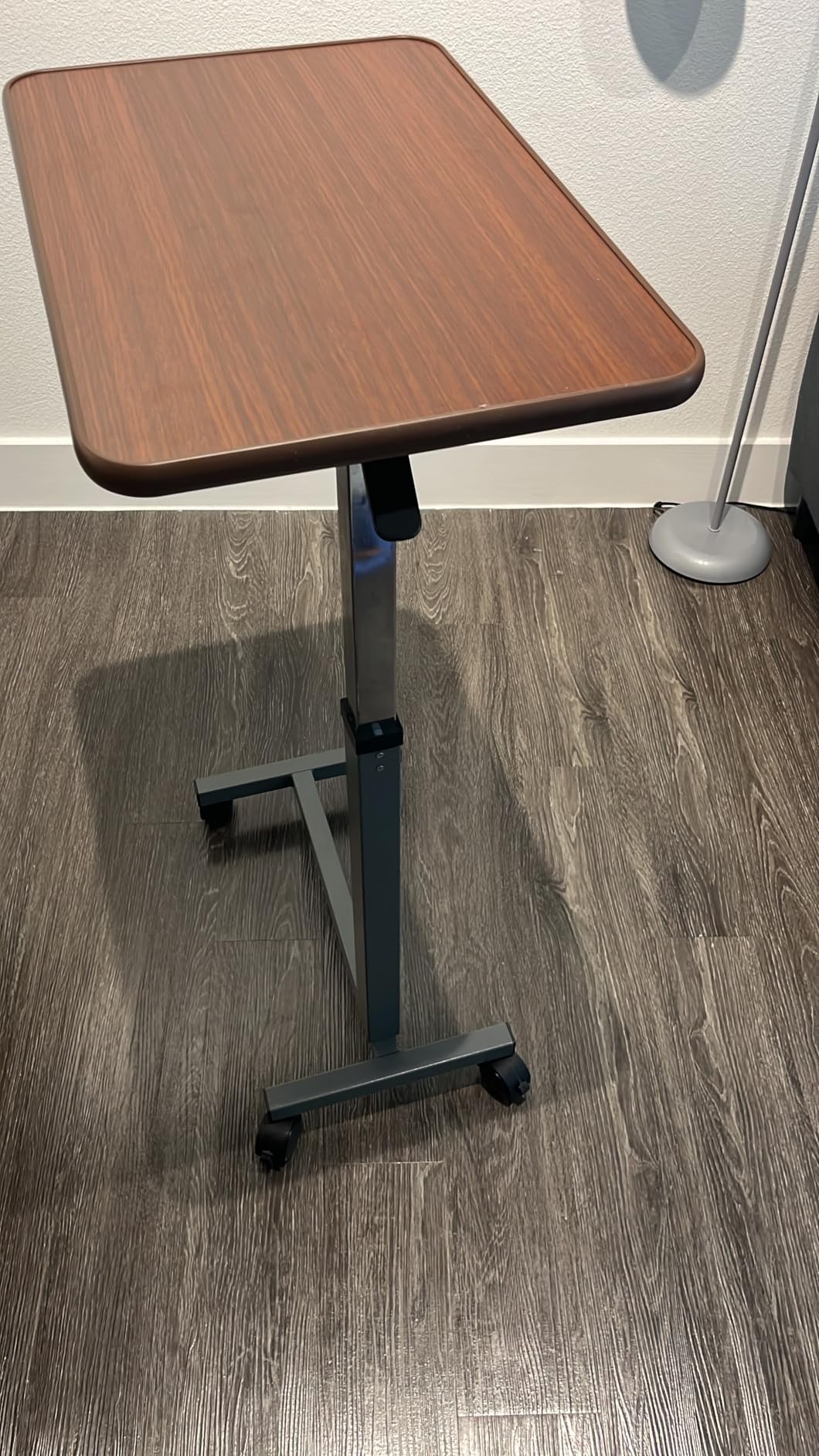 WOTURE Pneumatic Adjustable Overbed Bedside Table with Wheels - Hospital & Home Use, Medical Bed Table, Mobile Standing Desk, Rolling Laptop Cart, Non Tilt Surface(23.6