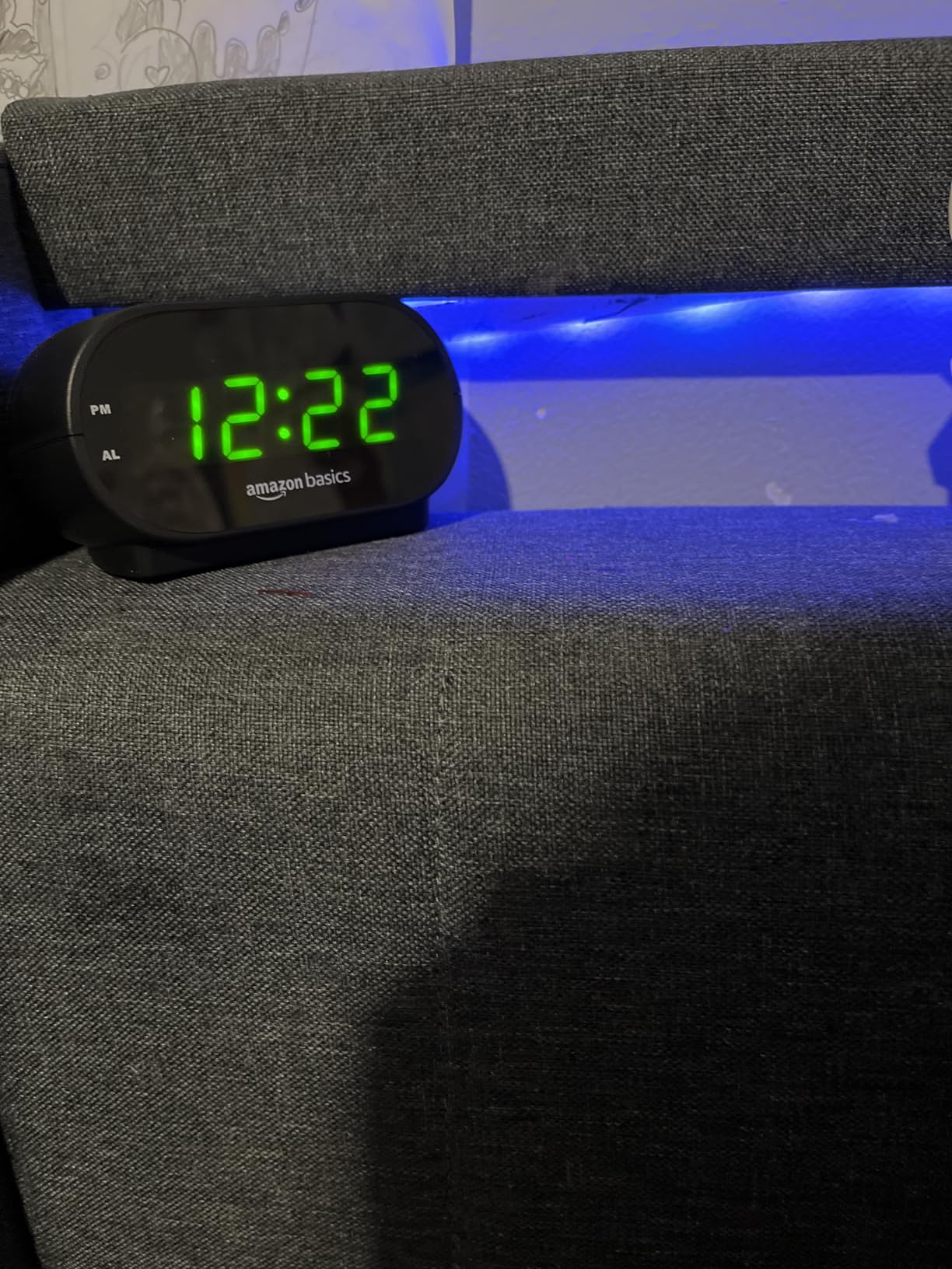 Amazon Basics Small Digital Oval Alarm Clock with LED Display, Nightlight, Snooze Function & Battery Backup, Black, 4.5 x 3.5 x 2.4 Inches customer photo 1