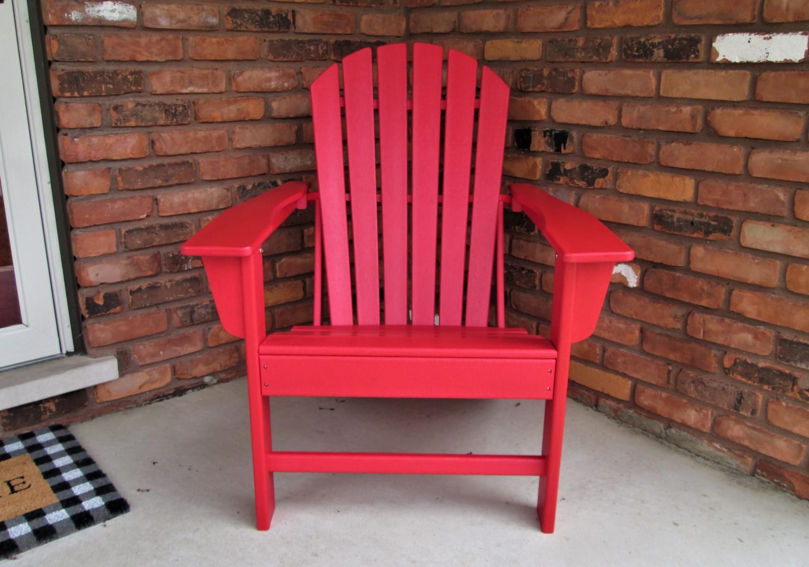Signature Design by Ashley 1-Piece HDPE Outdoor Adirondack Chair, Driftwood | Durable weather resistant HDPE, 36-pound stationary frame, Comfortable 16.25-inch elevated seat, Sundown Treasure Series customer photo 1