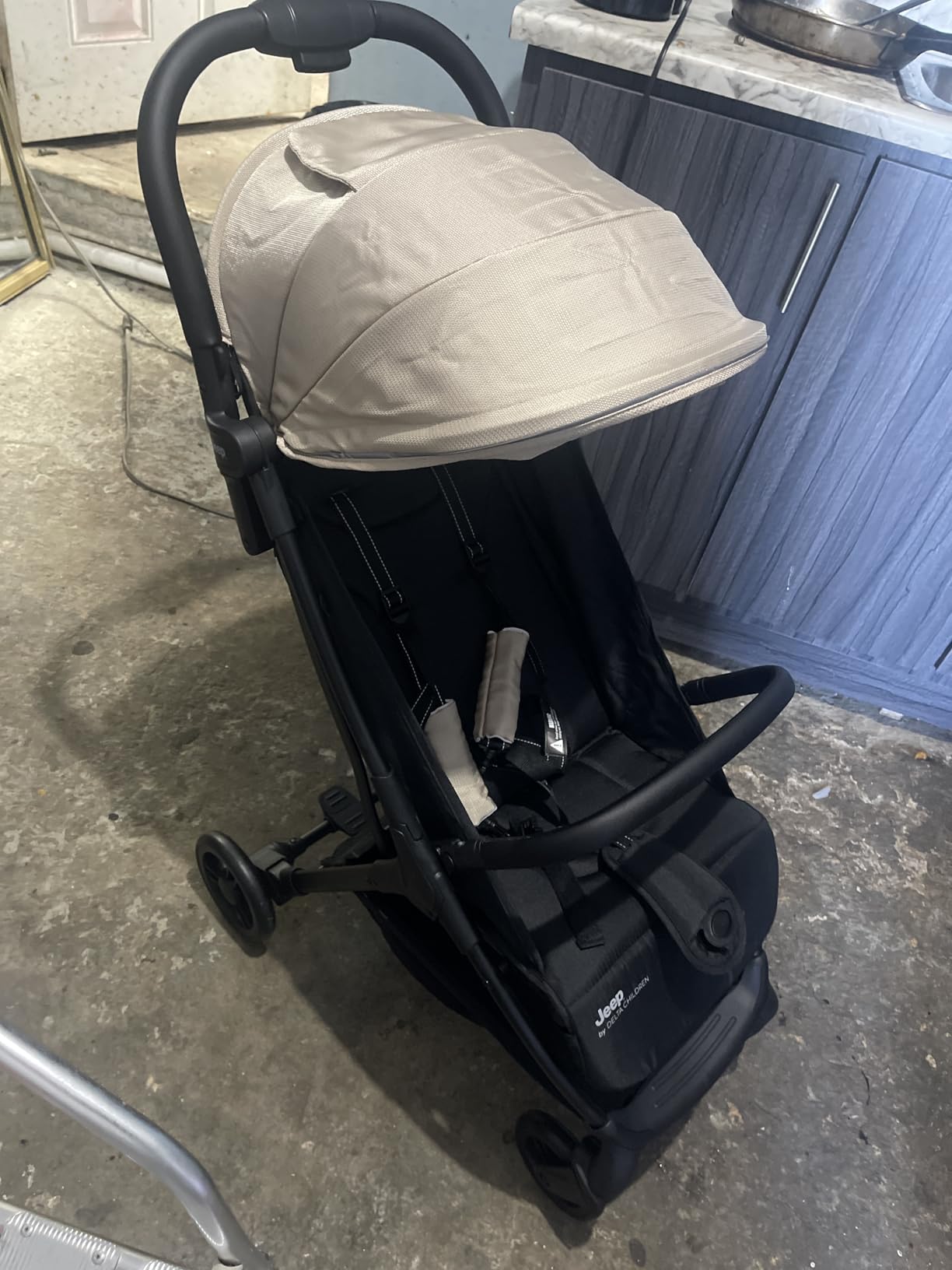 Jeep Altitude Compact Travel Stroller by Delta Children Greenguard Gold, Easy One Hand Fold, Lightweight, Extendable Canopy with Peek-a-Boo Window, Reclining Seat, 4 Wheel Suspension, Black customer photo 2