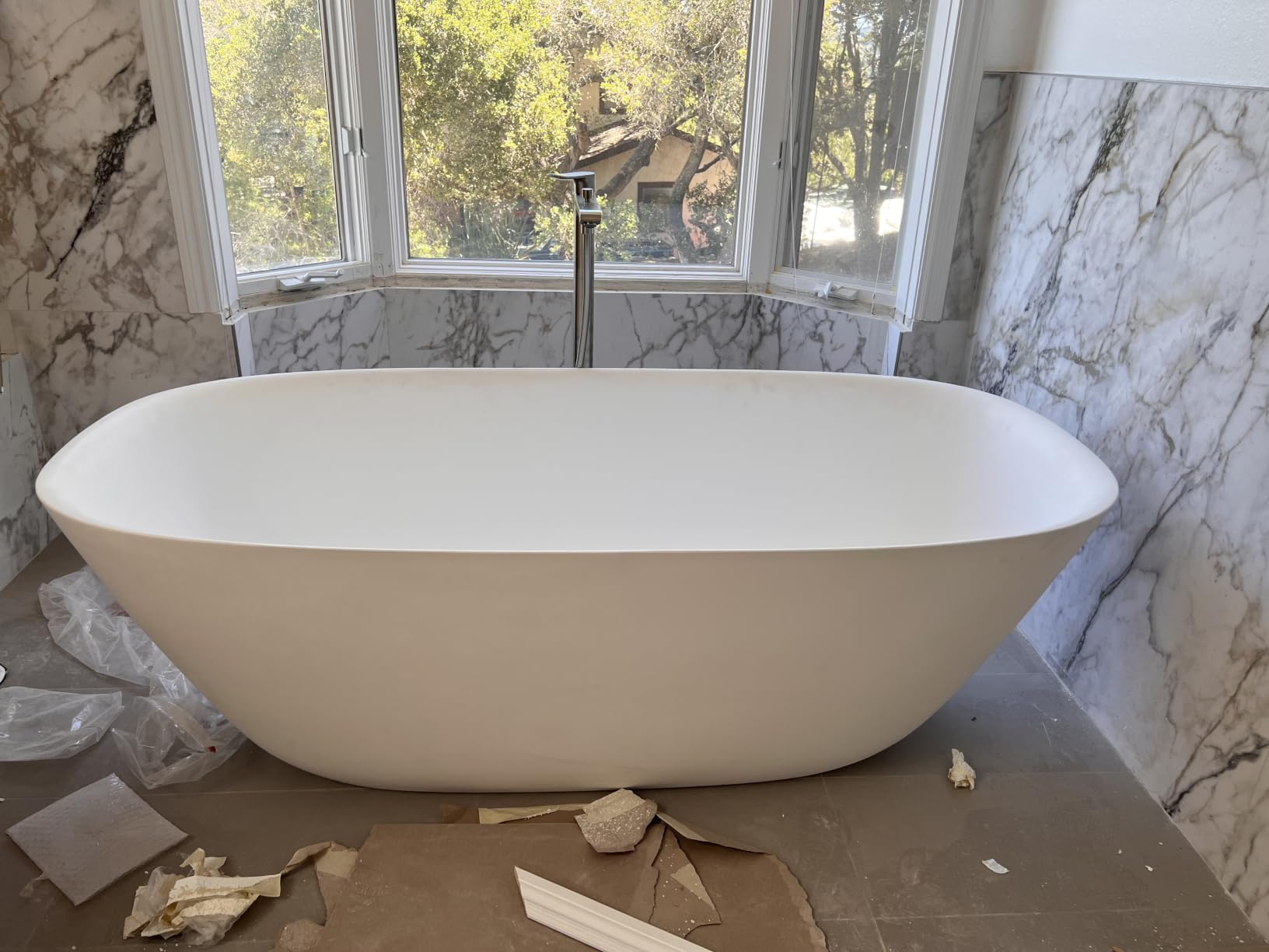 WOODBRIDGE 55 in. x 31.5 in. Stone Resin Luxury Contemporary Solid Surface Freestanding Bathtub in Matte White customer photo 1